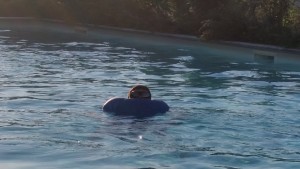 Me swimming in the pool when I inflated my swimm top sow I could breath undewater